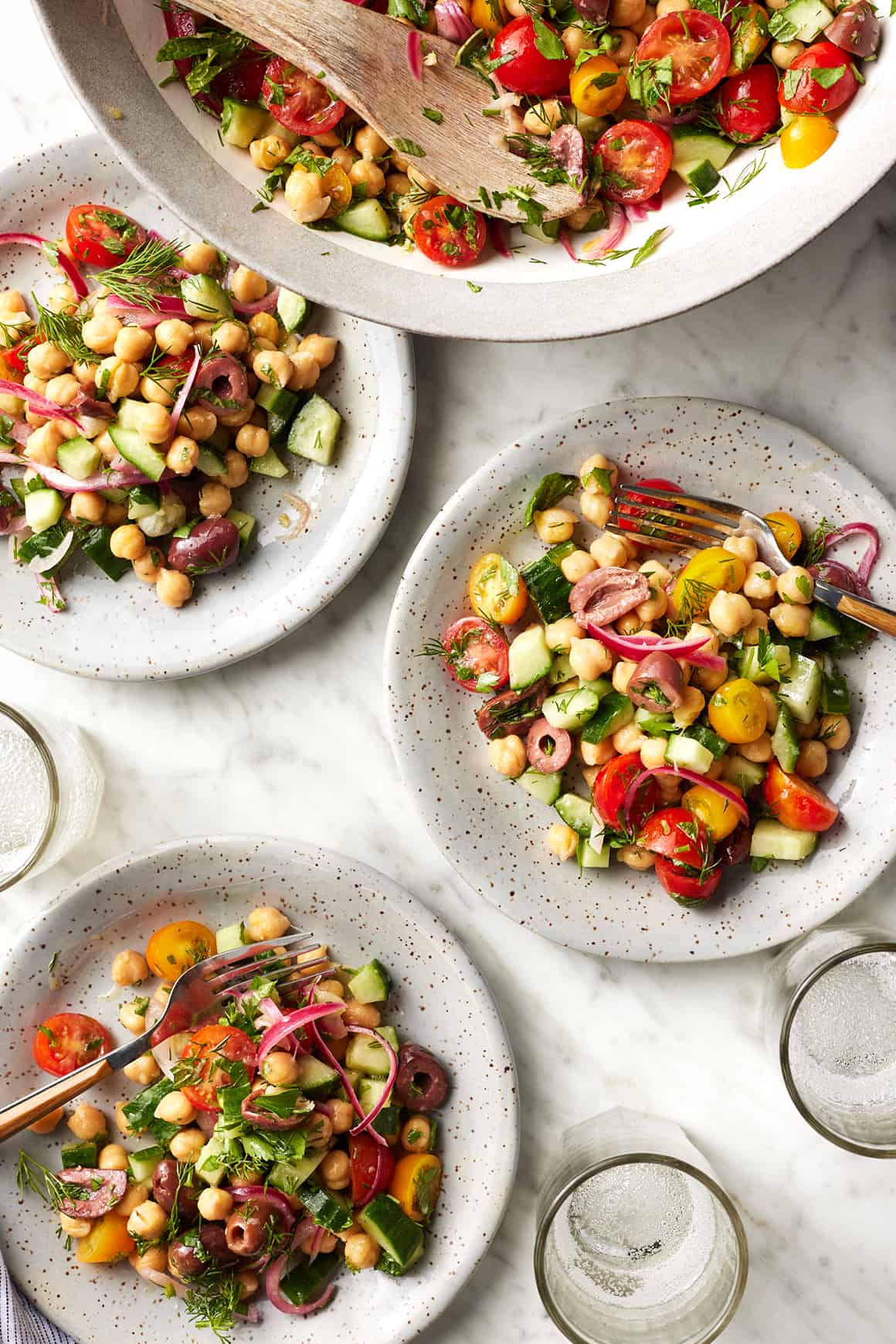 Chickpea salad recipe on three individual plates